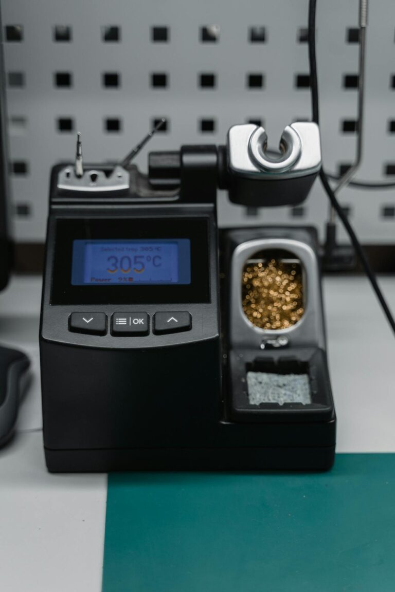 A digital soldering station with temperature display ready for precision electronic repair.